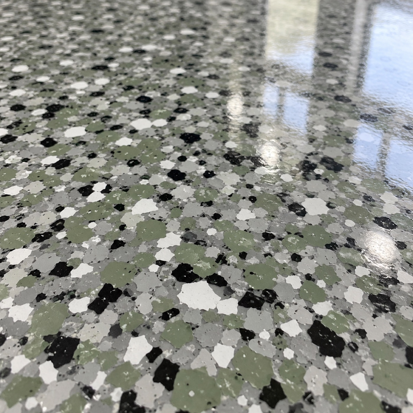 Green and white decorative epoxy flake detail